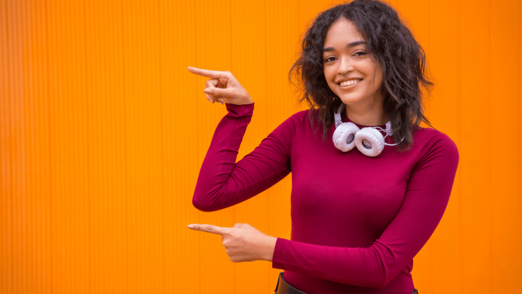 woman smiling and pointing