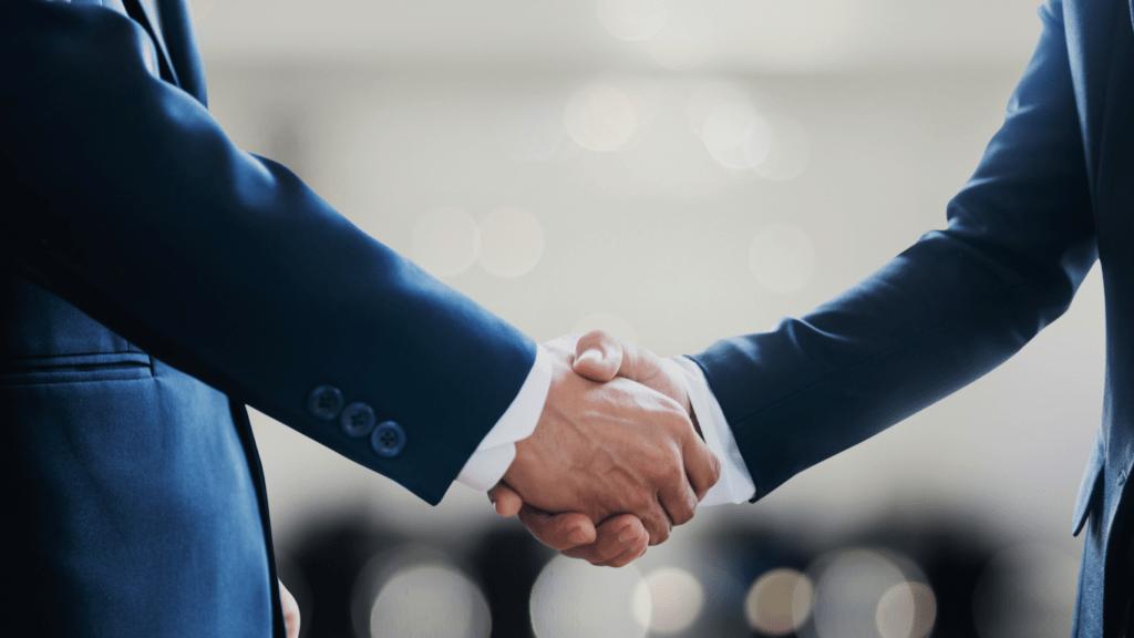 two business people shaking hands