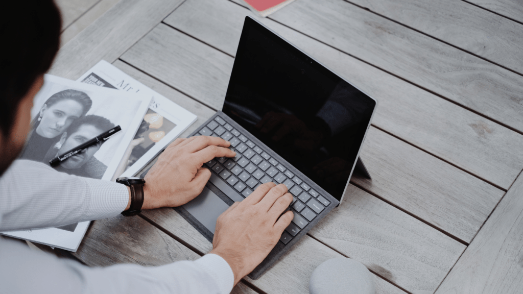 woman writing an article in her laptop