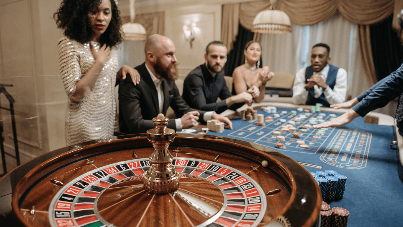 a people playing casino roulette